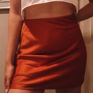 orange skirt with black dots